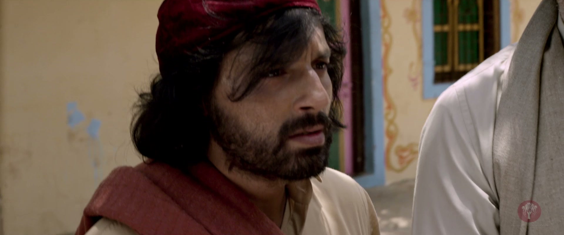 One of the musicians from Lahore in a village lane