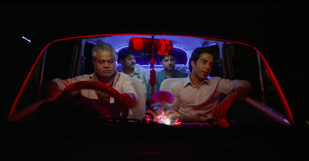 Firoz drives the three brothers through the night